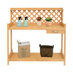 a wooden shelf with bottles and soaps on it next to a basket full of flowers