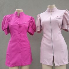 two female mannequins dressed in pink and pink dresses with ruffle sleeves