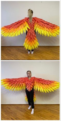 the woman is wearing an orange and yellow feathered bird costume with her hands on her hips