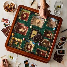 a person playing a board game on a table