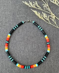 This necklace is handmade to last, with a nice colorful pattern, perfect for the summer ( or any time of the year, really)! This choker necklace gives bohemian-style vibes to your look. Each boho-style necklace was created with 6mm clay polymer discs, stainless steel-look lobster clasp, and 2 inch extender chain. I'm offering this necklace in seven different lengths. If you are interested in a different length or colors, please message me! My business thrives on Customer Satisfaction Please do not hesitate to reach me in case there is something wrong with your purchase. I will try my best to make it right for you. Thank you for shopping JGBestBeadedJewelry! Cheap Heishi Beads Necklace For Vacation, Clay Bead Choker Ideas, Diy Clay Bead Necklace, Clay Bead Necklace Ideas, Clay Bead Necklaces, Clay Necklace Ideas, Clay Beads Necklace, Western Jewelry Necklace, Bead Necklace Ideas