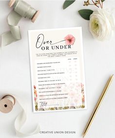 a wedding order card with flowers and ribbon on the table next to some tape measure