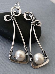 Classy looking pair of dangle earrings! The design is a 1.75" drop from the wire earring. One size fits all! Pearl Pendant Earrings, Anthropologie Earrings, Cheap Earrings, Alloy Earrings, Jewelry Card, Wire Earrings, Pearl Stud Earrings, Online Earrings, Pearl Studs