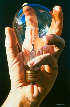 a person holding an electric light bulb in their right hand and the other hand is touching it