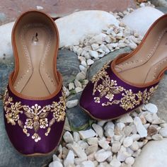 "--- FREE SHIPPING on each additional pairs when you pay for your first pair of shoes --- --- Wide feet? Not an issue. We offer choices for individuals with broader foot dimensions. Please contact us to discuss sizing details before placing your order ---   * Purple base with gold colour embellishments on flat shoes. * Cushioned Insole. * Leather Out sole. * Easy and comfortable to wear. * Perfect for every occasion. * Best in quality. * Handmade. Please choose your size from the below chart. If Indian Shoes Women, Elegant Flats With Gota Work For Festive Season, Traditional Party Flats With Gota Work, Gold Flats With Gota Work For Festivals, Bollywood Style Flat Wedding Shoes With Gota Work, Purple Juttis, Pakistani Shoes, Insole Design, Wedding Flats