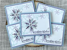 four cards with snowflake wishes on them