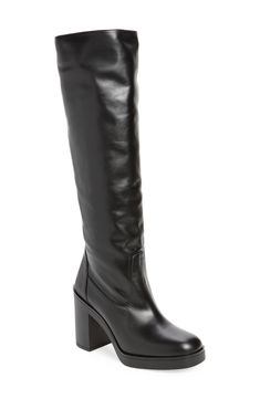 Elevate a wide range of looks with this knee-high boot artisanally crafted in Spain and set on a subtle platform and walkable block heel. 3 3/4" heel 15 1/4" shaft; 15 1/2" calf circumference Side zip closure Leather upper/synthetic linen/leather sole Made in Spain Shin High Boots, Knee-high Platform Boots With Block Heel, Luxury Block Heel Knee-high Boots For Fall, Luxury Knee-high Boots With Block Heel For Fall, Chic Platform Knee-high Boots, Leather Tall Platform Boots With Stacked Heel, Fall Calf Leather Knee-high Boots With Block Heel, Luxury Wide Calf Knee-high Heeled Boots, Luxury Knee-high Platform Boots With Reinforced Heel