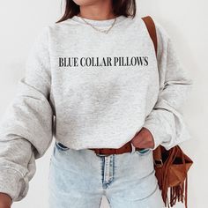 This trendy funny blue collar pillows sweatshirt would be so cute for any blue collar SO! Style this funny sweatshirt with some jeans for an easy, cute outfit! This classic unisex heavy blend crewneck sweatshirt is pure comfort. Fuzzy inside makes it oh so cozy! ☻ THIS IS A PHYSICAL ITEM! ☻ * 50% cotton & 50% polyester * Adult Unisex * Medium weight fabric (8.0 oz/yd²) * Gildan brand * Crew Neck ☻ SIZING ☻ PLEASE CHECK THE SIZE CHART IMAGE TO HELP YOU CHOOSE THE BEST FIT! WE DO NOT ACCEPT EXCHANGES, RETURNS OR CANCELLATIONS. Once an order is received it goes straight into production and we are unable to cancel orders or make changes. DESIGN SIZE IS SCALED DOWN ON SIZES S & M BUT REMAIN THE SAME SIZE ON SIZES L, XL & 2XL ☻ CARE INSTRUCTIONS ☻ -Turn garment inside out. -Machine wash cold. -L Bold Serif Fonts, Colorful Sweatshirt, Pull Bebe, Emergency Nursing, Nurse Sweatshirt, Santa Baby, How To Measure, Modern Retro, Look At You