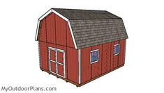 a small red barn with a gray roof