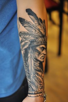 Forearm tattoo of a Native American chief with a feathered headdress. Native Woman Tattoo, Native American Tattoo Ideas, Indigenous Tattoo Ideas, American Tattoo Ideas, Native American Warrior Tattoos, Native American Tattoo Designs, Unique Tattoo Ideas, Native American Music, American Indian Tattoos