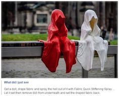 two people are sitting on a bench with red and white cloths covering their faces