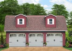 a two car garage with three windows on the top floor and one above the door