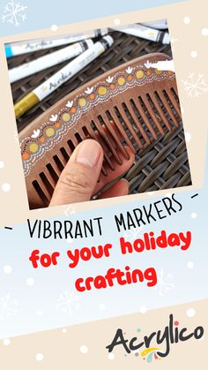 a person holding a comb in their hand with the words vibrant markers for your holiday crafting