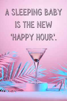 a pink background with palm leaves and a martini glass that says, a sleeping baby is the new happy hour