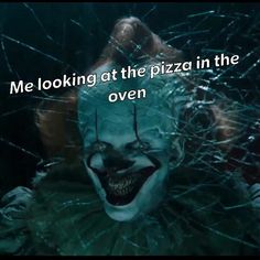 a creepy clown with the words me looking at the pizza in the oven