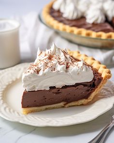 a slice of chocolate pie with whipped cream on top