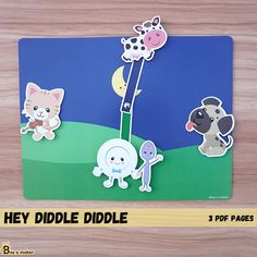 a card with some animals on it and the words hey diddle dodle written below