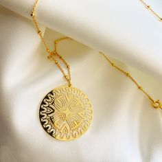 Very elegant Jewelry for women| , eye catching BIG circle necklace with stunning filigree, gold cut-out round geometric rosette medallion hanging on a  cute satelite  chain .  Available matching earrings and in sterling silver 925. ♡ DETAILS  Disc: 1.18"" (3 cm)  length   : 45 or 50 cm- 17.7" or 19.7" Material: 24k gold plated 925 Sterling Silver The jewelry is made entirely of 925 sterling silver or  24K gold plated  elements. Gold plated is a sterling silver 925 coated with 24K gold. The eleme Elegant Medallion Necklace For Anniversary, Elegant Gold Medallion Necklace With Flower Pendant, Elegant Yellow Gold Medallion Necklace, Gold-plated Medallion Necklace With Clavicle Chain, Elegant Gold Medallion Charm Necklace, Elegant Yellow Gold Circle Charm Necklaces, Gold Plated Medallion Necklace With Clavicle Chain, Elegant Gold-plated Medallion Necklace With Adjustable Chain, Gold-plated Necklace With Elegant Design