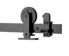 a black and white photo of a wall mounted tv bracket with two wheels on each side