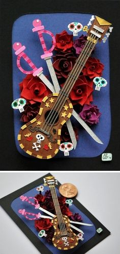 a guitar and some roses on a blue plate with the word love spelled in it