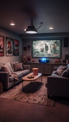 a living room filled with furniture and a flat screen tv mounted to the side of a wall