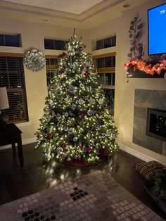 a decorated christmas tree in a living room