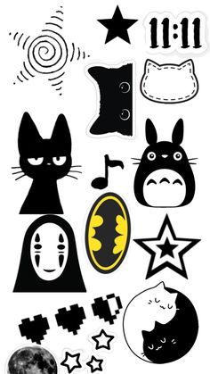 some black and white stickers that are on a sheet with stars, moon, and other items