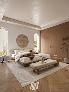 a bedroom with a large bed and wooden floors