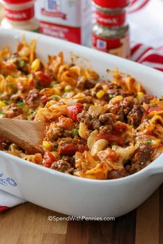 a casserole dish filled with ground beef and pasta