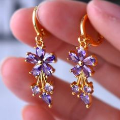 Nwt Gorgeous Pierced Earrings With Purple Stones. Elegant Purple Flower Earrings, Elegant Purple Flower Shaped Earrings, Elegant Lavender Flower Earrings With Ear Wire, Purple Amethyst Hoop Earrings For Gift, Purple Flower Earrings For Party With Ear Wire, Elegant Purple Amethyst Hoop Earrings, Purple Flower-shaped Pierced Earrings, Lavender Flower Jewelry For Pierced Ears, Elegant Purple Hoop Earrings For Gifts