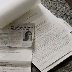 some papers are laying on the floor next to each other and one has a piece of paper attached to it that says, daughter & friends mother's body