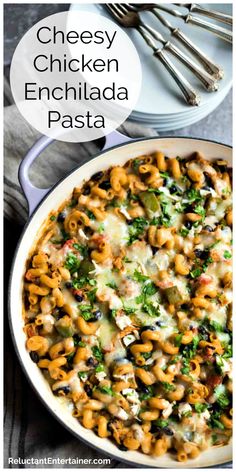 cheesy chicken enchilada pasta in a white pan