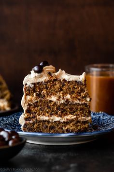 a slice of carrot cake on a blue plate