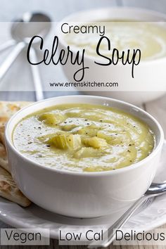 a bowl of creamy celery soup on a plate with pita bread in the background