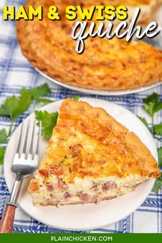 ham and swiss quiche on a white plate with a fork next to the pie