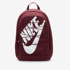 a maroon and white nike backpack