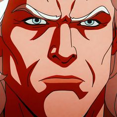 an animated image of a man with red hair and blue eyes looking at the camera