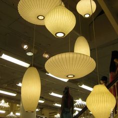 the lights are hanging from the ceiling in the store