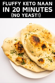 two flatbreads on a white plate with the words fluffy keto naan in 20 minutes no yeast