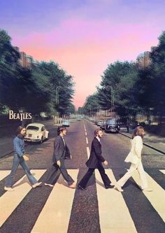 the beatles are walking across the street