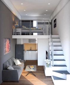 a living room filled with furniture and a stair case in front of a loft bed