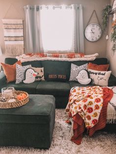 a living room filled with furniture and pillows