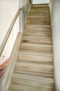 the stairs are made of wood and have no railings