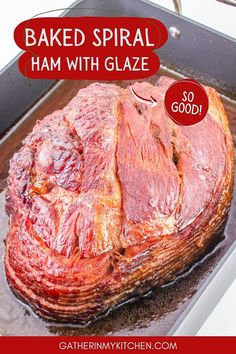 baked spiral ham with glaze on a baking sheet in the oven and text overlay reads baked spiral ham with glaze so good