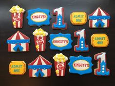 decorated cookies with numbers and carnival theme for 1st birthdays, including one that reads 1