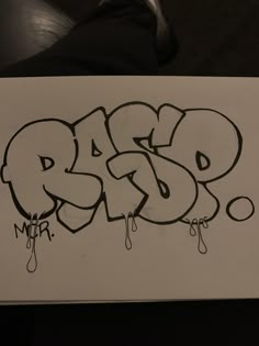 a piece of paper with graffiti written on it