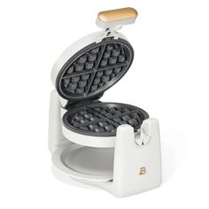 a waffle maker is shown on a white background