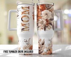 two travel mugs with the words mom and flowers on them