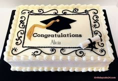 a graduation cake with congratulationss on it