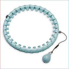 a light blue bracelet with an ear plug attached to it